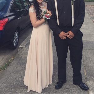 A long nude prom dress. Off the shoulder.